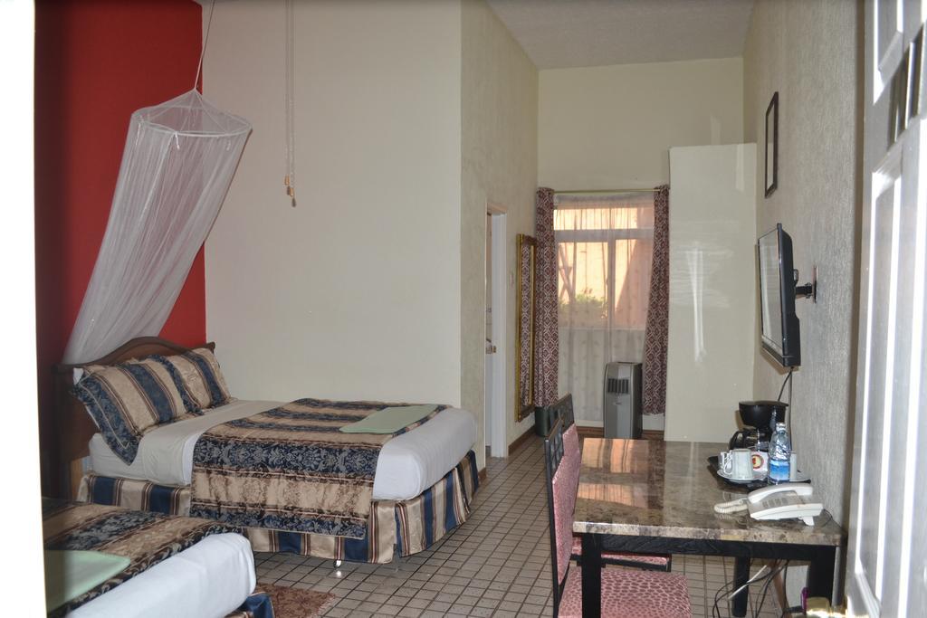 Executive Airport Hotel Entebbe Pokoj fotografie